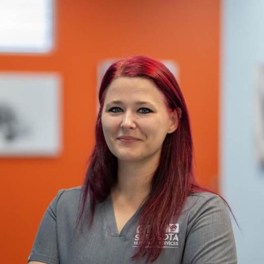 Sarah, lead veterinary technician, at the veterinary clinic in Sarasota