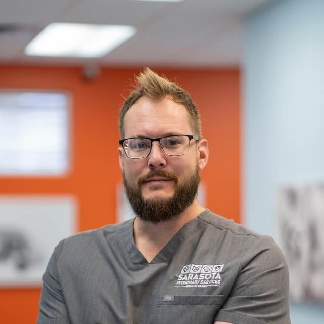 Thomas, veterinary technician, at the veterinary clinic in Sarasota